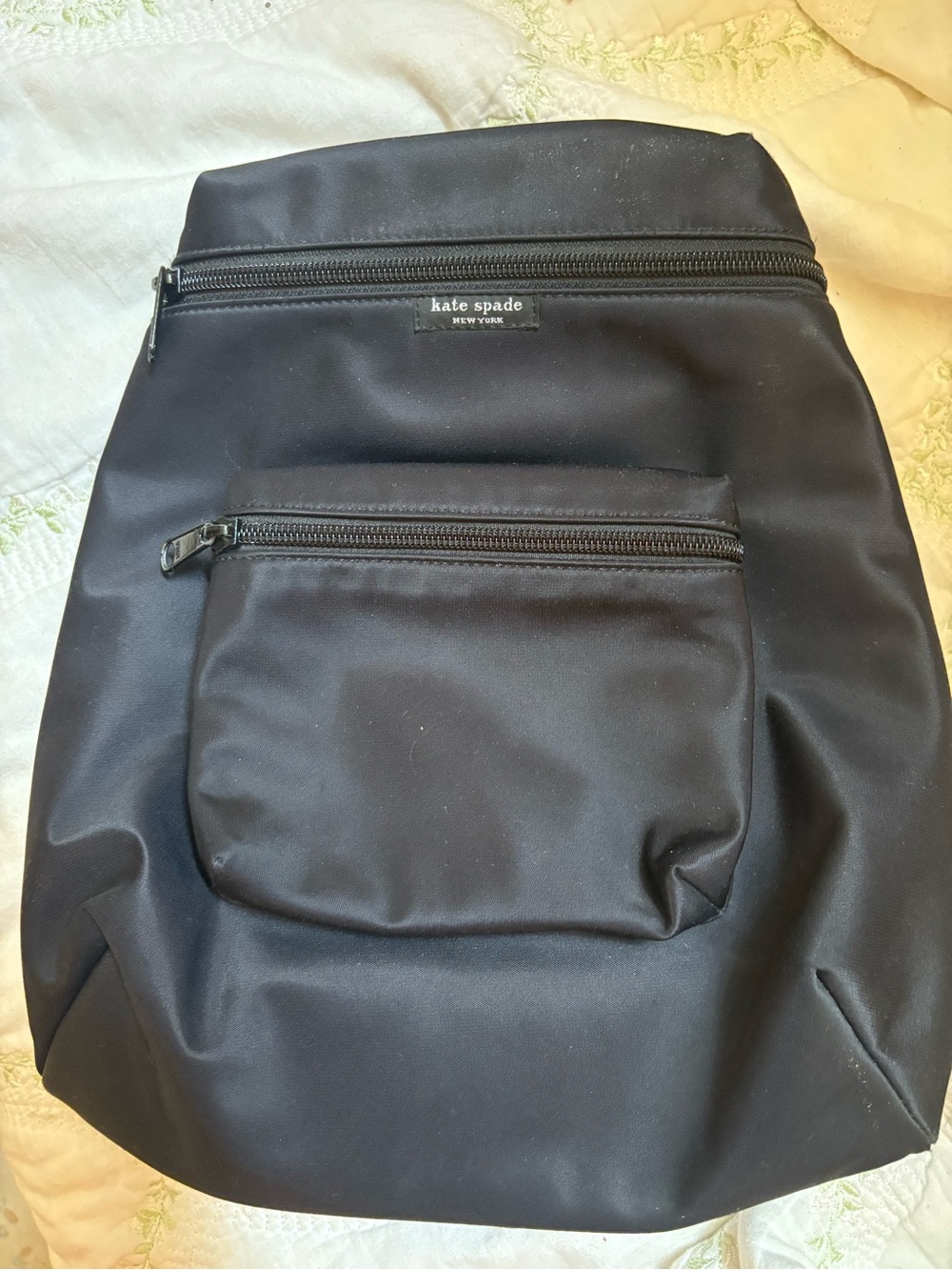 kate spade black nylon backpack with front zip pocket. Perfect condition!